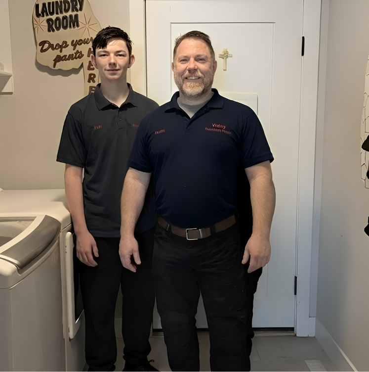 Oven repair technician speaking to a client in Holland, MI.